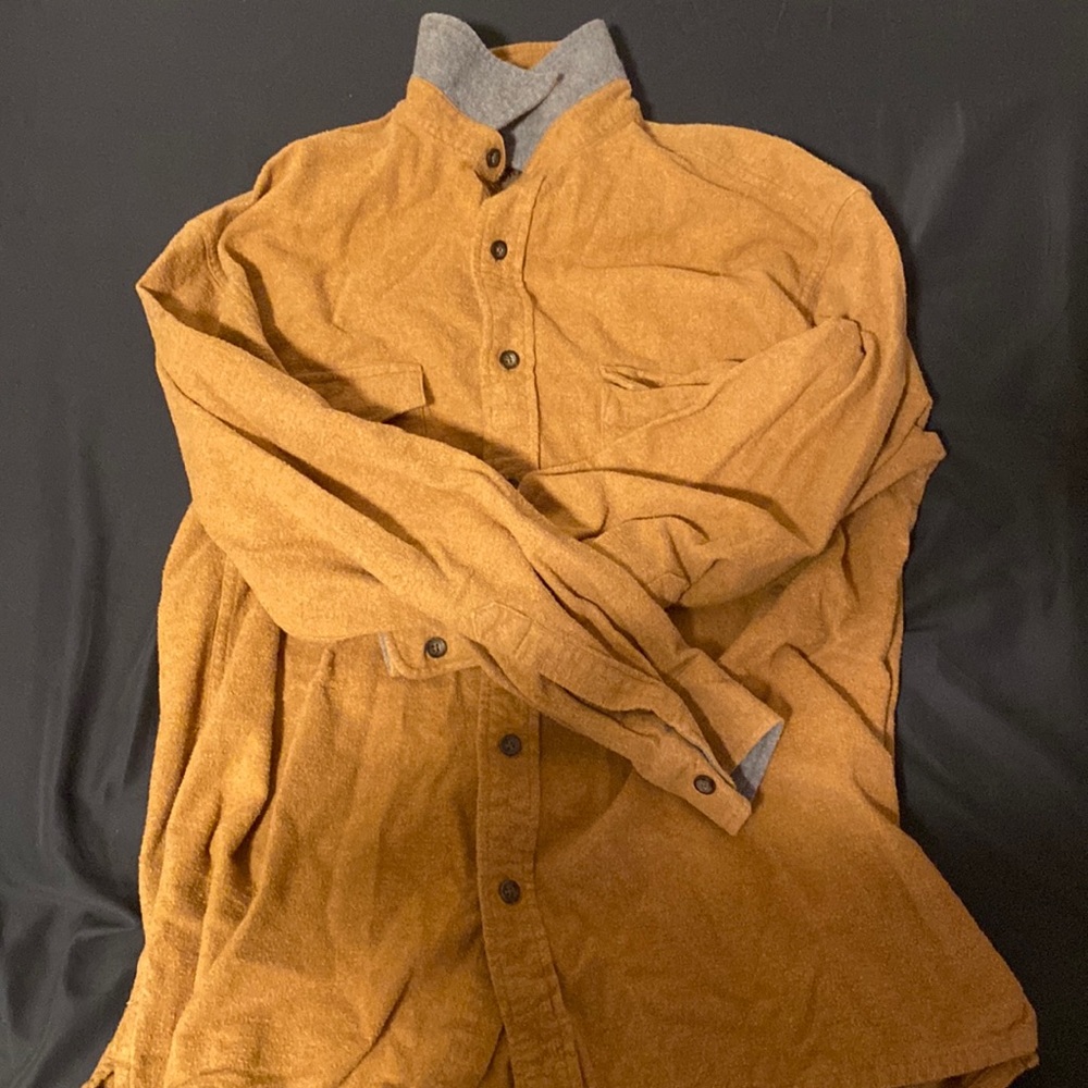 Tan button-up shirt
